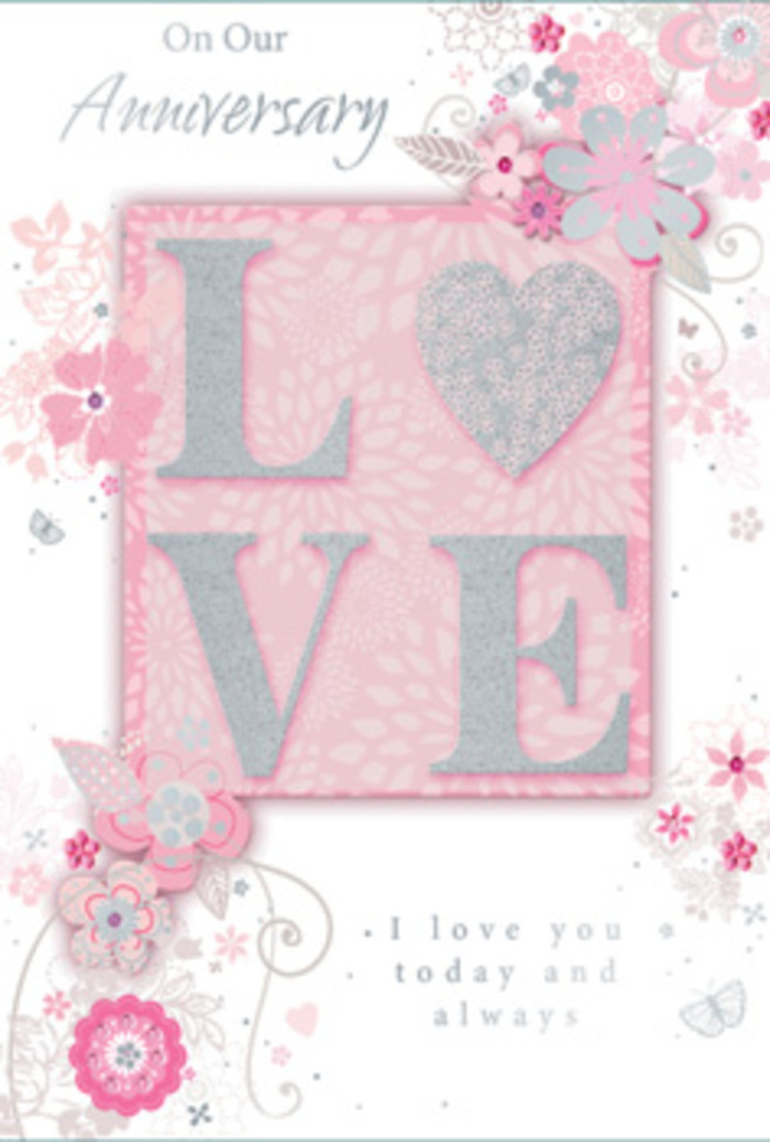 This anniversary card opens like a moment of stillness in a sunlit room, a feeling many of our Castelnau customers recognise when they lay it beside a vase of fresh flowers on their kitchen table. Dominating the centre is the word LOVE, printed in softly raised letters and finished with a frosted, twinkling glitter that catches the light in a gentle, playful way, much like the subtle sheen on a spray of fresh eucalyptus. The letters are tactile enough to feel each edge under your fingers, inviting a lingering touch. Around this central motif drift wispy, hand-drawn flowers and sprays of foliage, their petals and leaves washed in tones of pink, lilac, and creamy ivory that blend harmoniously, as if brushed in watercolour. Slender flourishes and filigree lines weave between the blooms, and here and there, almost shyly hidden, sit tiny butterfly shapes, suggesting the quiet flutter of anticipation you might feel before an anniversary dinner in nearby Barnes or a walk along the river. The background remains a soft, warm blush, creating the sense of standing inside a flower, safe and cherished. Nestled beneath the design is the simple message, I love you today and always, set in graceful, understated type that supports rather than competes with the floral artwork. The overall mood is one of heartfelt constancy rather than showiness, like a long-tended rosebush in a Castelnau garden. This card feels as carefully composed as a hand-tied bouquet, turning paper, ink, and glitter into a quiet yet enduring expression of love.